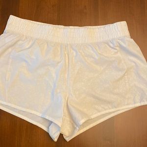 Marika white athletic shirts size large